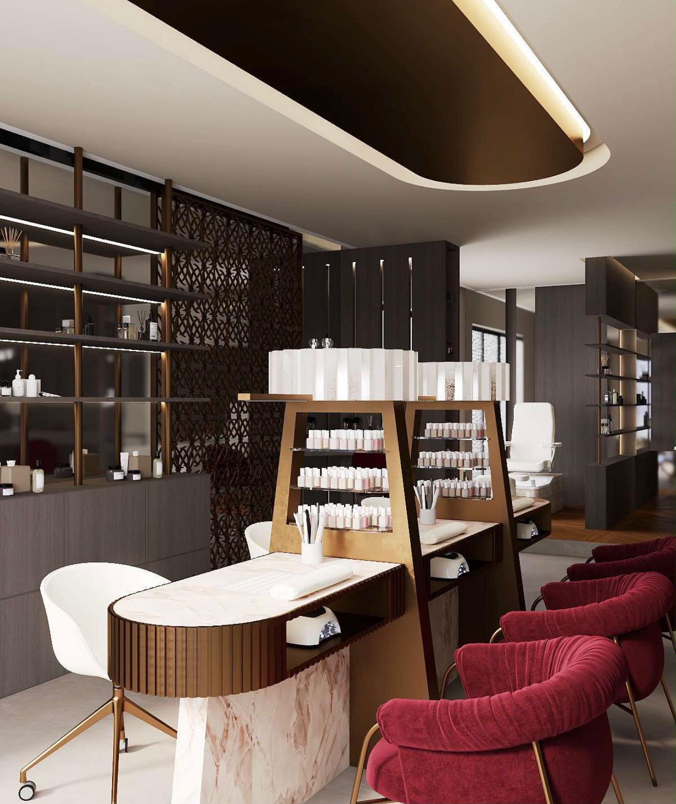 Area nail con postazioni manicure in ottone, espositori smalti e sedute bordeaux